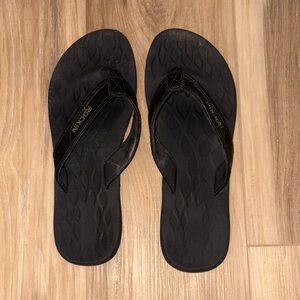 Well Worn Black Flip Flops